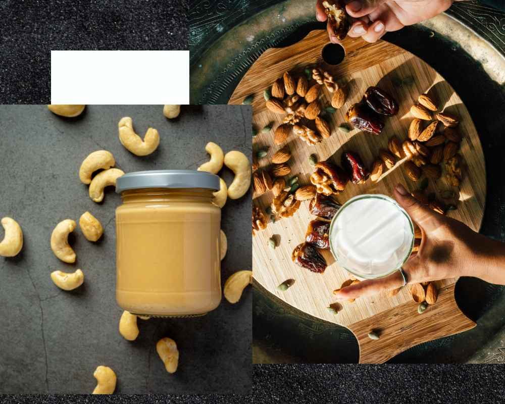 Cashew butter jar with scattered cashews and a glass of nut milk with assorted almonds and dates as dairy-free alternatives to heavy cream.